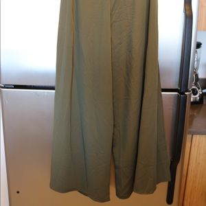 Green flowy pants with slits